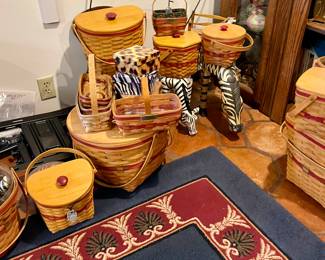 We have an enormous collection of Longaberger Baskets, well over 100!