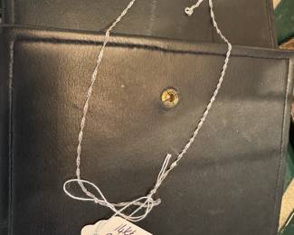 #168 - $66 - 14kt white gold light chain 