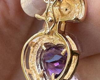 #48J - $600 - Amethyst heart pendant w/22 inches 14kt gold a Singapore chain 7.3 gr. 
A Singapore chain is a type of jewelry chain with a distinctive twisted and braided link design that creates a strong, yet lightweight chain