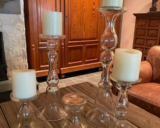 #48 -	$80 set of 5 glass candleholders 2' the tallest.
