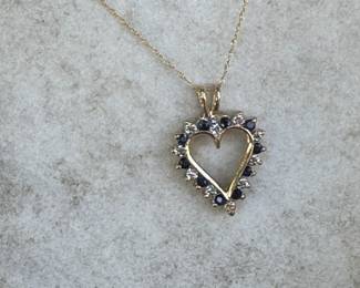 #49J - $225 - Sapphire & diamond heart pendant with 18" (10kt gold) chain. 