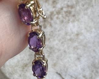 #64J - $295 Amethyst bracelet, 10kt gold. 6.5 grams