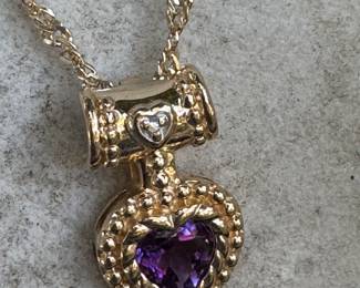 #48J - $600 - Amethyst heart pendant w/22 inches 14kt gold a Singapore chain 7.3 gr. 
A Singapore chain is a type of jewelry chain with a distinctive twisted and braided link design that creates a strong, yet lightweight chain