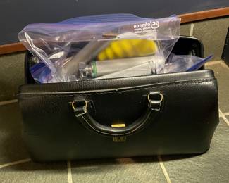 #83 - $80 Vintage Doctor bag with items