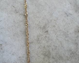 #48J - $600 - Amethyst heart pendant w/22 inches 14kt gold a Singapore chain 7.3 gr. 
A Singapore chain is a type of jewelry chain with a distinctive twisted and braided link design that creates a strong, yet lightweight chain