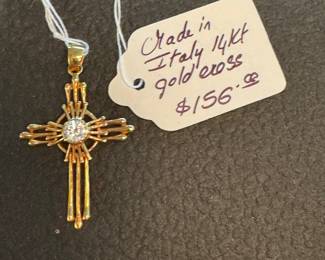 #171 - $156 - 14kt gold marked Italy cross with CZ center 