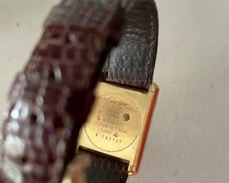 #67J- $1750 - Must de Cartier Paris Men vintage tank 1982 - 925 vermeil colored stripes dial. Manual wind. with original box, authenticity card. Band is original Cartier. Barely worn. 