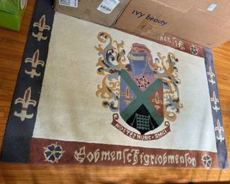 #126 -	$100 Family crest carpet Pier imports 71x48
