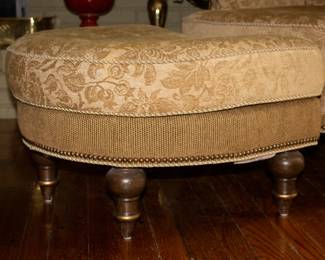 Closeup of vintage arm chair with matching ottoman