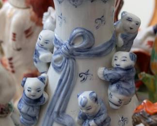 Porcelain Chinese vase with little boy figures climbing it, a reference to the One Hundred Boys theme that expresses an agricultural society's abiding wish for teeming male offspring