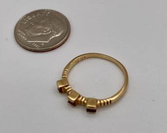 14k gold ring with three square rubies, artist's stamp inside