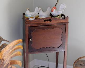 Georgian bedside cabinet / nightstand, standing on tapered legs and features a shaped gallery with pierced handles