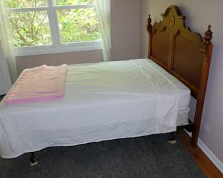 Bed frame with carved wooden headboard, boxspring, mattress