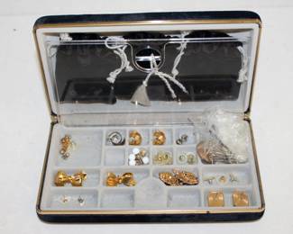 Collection of earrings in small lidded box, includes several small cloth drawstring pouches in lid 