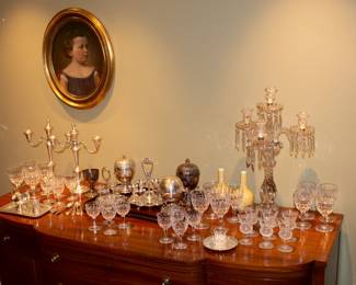 Antique Victorian silverplate egg cup servers (four-cup and six-cup), three antique Victorian silverplate egg coddlers, antique crystal candelabra c. 1915 with a swirl pattern, silverplate candelabras, crystal and etched glass wine and cordial glasses, silverplate trays, and more!