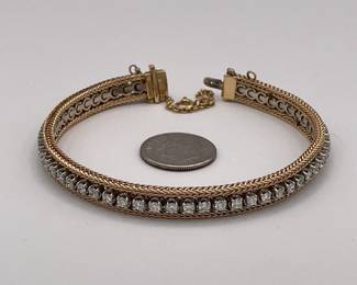 14k gold and diamond tennis bracelet with safety chain