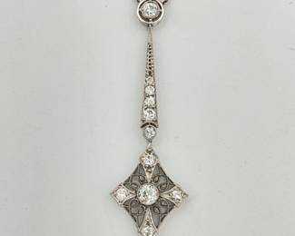 Closeup of 14k white gold and diamonds delicate chain link Art Deco lavalier pendant necklace, c. 1915