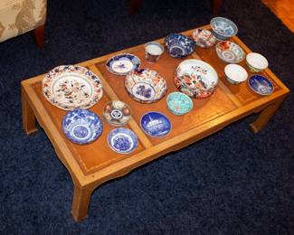 A collection of Japanese and Chinese porcelains, along with some English blue and whites
