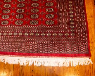 Closeup of large area rug in glowing colors