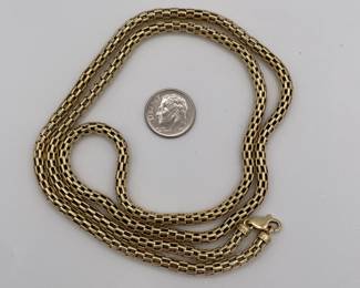 Closeup of 14k gold necklace