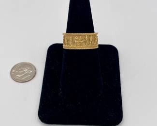 Heavy gold Middle Eastern ring, bas relief figures around the band