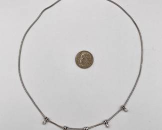 Another view of 14k white gold serpentine necklace with 5 pendant diamond spacers,, made in Italy