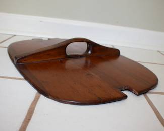 Lid from the antique hand-crafted curved wooden lidded basket with handle and side latches