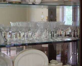 Fine selection of delicately etched glass wine and cordial glasses