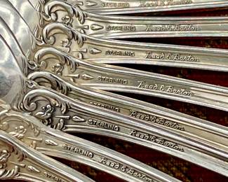 Closeup of the spoons from the set of Reed & Barton Mirrorstele Francis I pattern sterling silver handle flatware