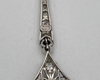 Closeup of Reverse of 14k white gold and diamonds delicate chain link Art Deco lavalier pendant necklace, c. 1915