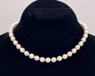 Beautifully matched cultured pearl choker necklace with 14k gold rose form clasp