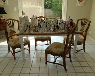 Table with four Drexel Heritage fruitwood 'Wheat' Back dining chairs