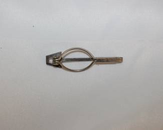 Reverse side of silverplated SWANK KLIP