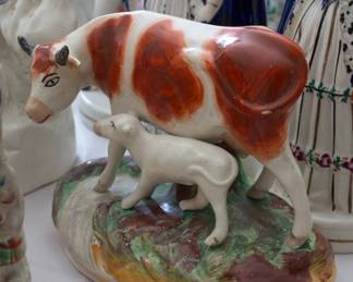 Antique porcelain cow and calf