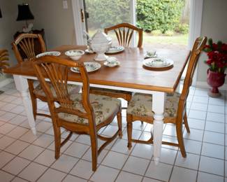 Table with four Drexel Heritage fruitwood 'Wheat' Back dining chairs; Royal Worcester Fine Bone China place settings