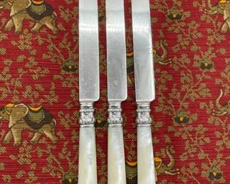 Wm. Rogers Mfg. Co. mother of pearl handled sterling silver collared knives