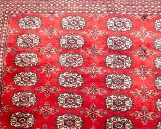 Closeup of large area rug in glowing colors