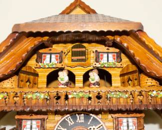 Closeup of vintage cuckoo clock, Black Forest chalet style