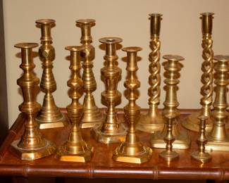  Multiple pairs of antique brass candlesticks