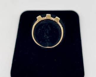 14k gold ring with three square rubies, artist's stamp inside