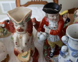 English Staffordshire Begging Spaniel Dog Toby Jug pitcher Red White 1850 - 1870, and a Staffordshire 'Hearty Good Fellow' Toby jug, circa 1840