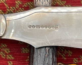 Another closeup of antique Victorian era stag horn silver plate collared fish knife and fork
