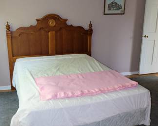 Bed frame with carved wooden headboard, boxspring, mattress