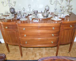 Stunning bow front sideboard, 3 central drawers flanked by single drawers and cabinet doors