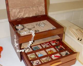 Jewelry chest, wooden, lined, three drawers and top compartment, miscellaneous jewelry – bracelets, holiday brooches, necklaces, cuff links, shirt studs, enameled boxes