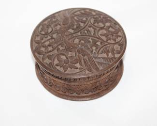 Another view of small carved wooden circular box, pair of birds (pheasants?) and flowering plants on lid