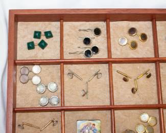 Some of the cufflink and shirt stud sets