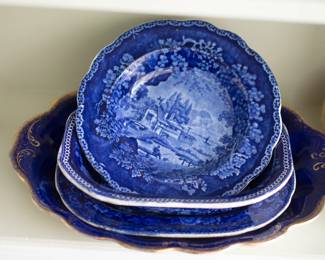 Staffordshire dark blue transferware dinner plate with a scene of cottages by a river by Adams