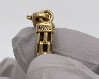Closeup of 14k gold necklace clasp