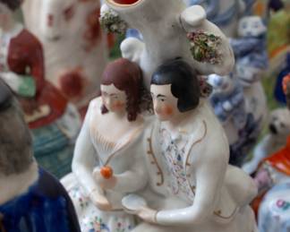 Antique Victorian porcelain spill vase with courting couple